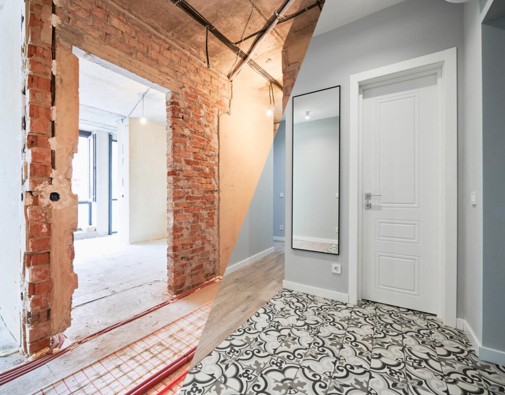 Interior undergoing renovation: exposed brick walls, unfinished doorway, and a contrast between raw and finished surfaces with a large mirror along a blue-gray wall and patterned tile flooring at the threshold.